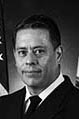 black and white photo of head picture for fire chief pena