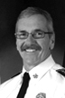 black and white photo of head picture for fire chief garrison