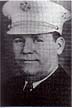 black and white photo of head picture for fire chief lyles